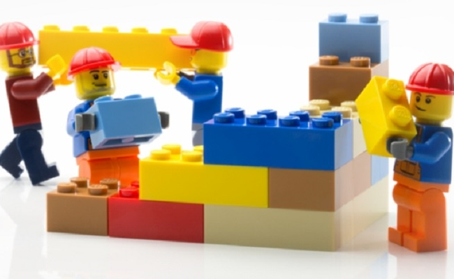 Lego men building with lego